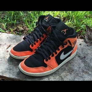 Air Jordan One Mid in Orange and Black